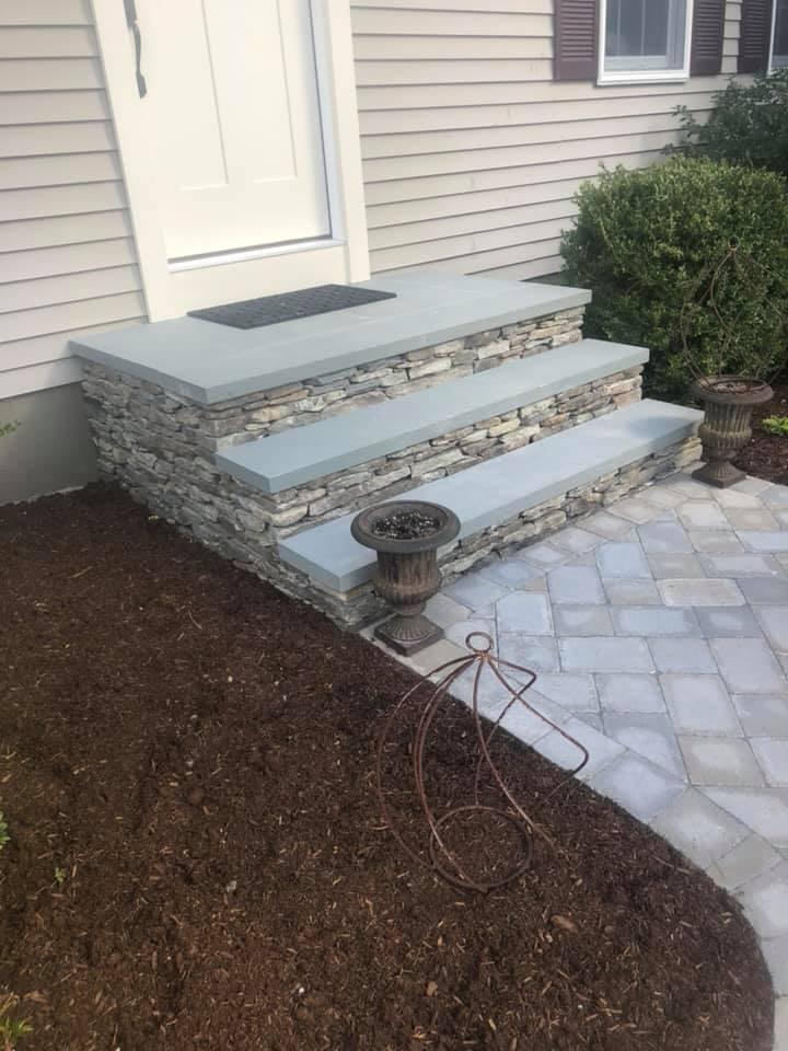 Paver steps and landscaped entry